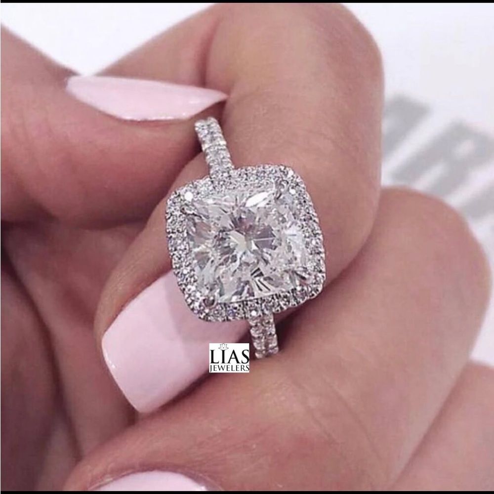 New 18k white gold engagement ring